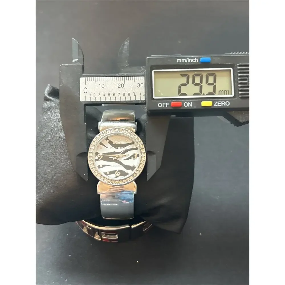 Waltham Zebra Print Dial Silver Tone Women’s Cuff Quartz Watch